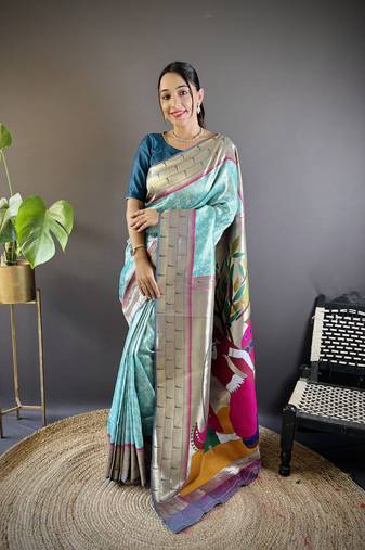 Blue banarasi silk saree with gold zari patta and contrast blouse