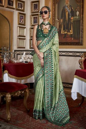 Soft silk woven printed patola designed saree (pista green)