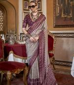 Soft silk woven printed patola designed saree (beige)