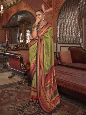 Soft silk stripped patola saree for women (parrotgreen) 1