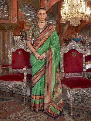 Soft silk stripped patola saree for women (green) 1