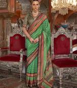 Soft silk stripped patola saree for women (green)