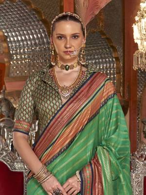 Soft silk stripped patola saree for women (green) 2