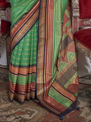 Soft silk stripped patola saree for women (green) 3