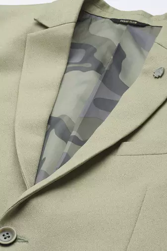single-breasted regular fit green blazer with lapel pin