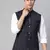 dark blue nehru jacket with bold khaki chex