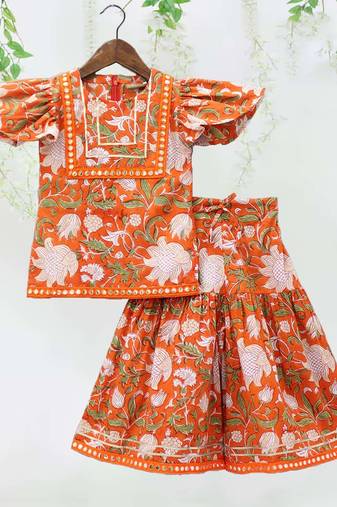Orange color round neck flutter sleeves mirror work kurti with sharara