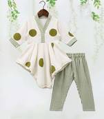 white polka dot asymmetrical kurti with green striped pant