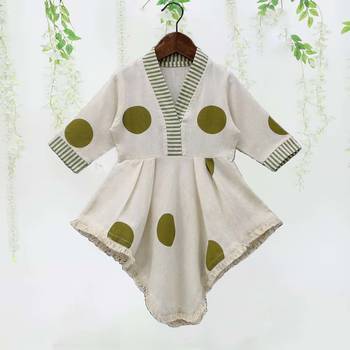 white polka dot asymmetrical kurti with green striped pant 3