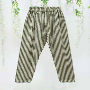 white polka dot asymmetrical kurti with green striped pant 4