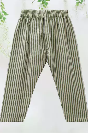 white polka dot asymmetrical kurti with green striped pant