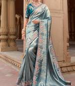 Blue silk organza jacquard woven with heavy embroidery work lace border with embroidery blouse saree with blouse