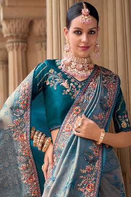 Blue silk organza jacquard woven with heavy embroidery work lace border with embroidery blouse saree with blouse 3