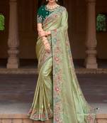 Light green silk organza jacquard woven with heavy embroidery work lace border with embroidery blouse saree with blouse