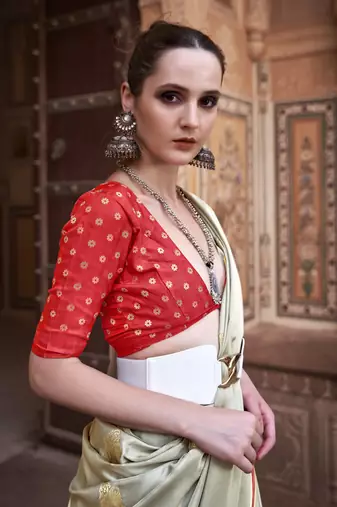 Light green sattin silk blend with zari weaving saree with blouse