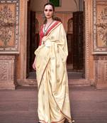 Cream sattin silk blend with zari weaving saree with blouse