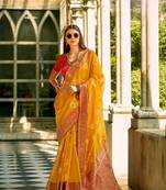 Yellow soft tissue silk blend with zari weaving saree with blouse