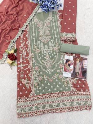 Green embroidered vichitra pakistani suit 3