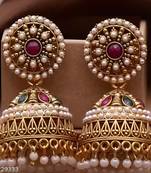 Exquisite kundan jhumka earrings with pearl accents