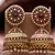 Exquisite kundan jhumka earrings with pearl accents