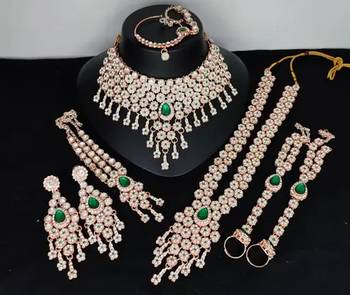 Emerald green bridal jewelry set - premium ad choker set with nath, earrings & hand chain - wedding collection 1