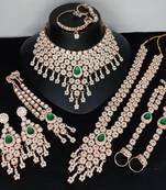 Emerald green bridal jewelry set - premium ad choker set with nath, earrings & hand chain - wedding collection