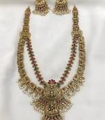 Exquisite gold-plated bridal necklace and earrings set with ruby and emerald accents