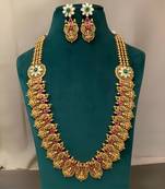 Opulent gold and gemstone necklace set