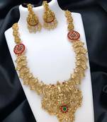 Traditional temple design gold necklace set with red and green stone accents - bridal jewelry