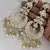 Opulent floral pearl chandelier earrings - exquisite bridal jewelry