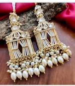 Exquisite handcrafted gold-plated jhumka earrings with pearl beads – perfect for weddings & festivals