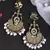 Traditional gold-plated chandbali earrings with bird motif and pearl drops     perfect for weddings & festive occasions