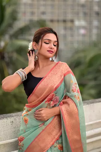 Sky blue tissue crush silk floral printed saree with zari woven border