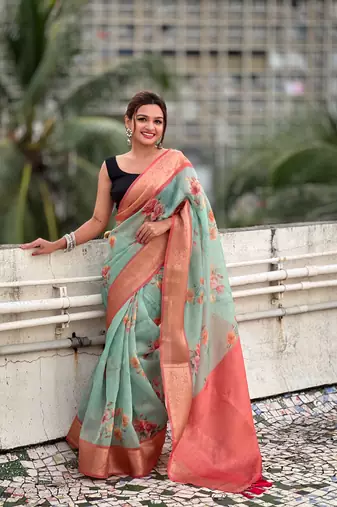 Sky blue tissue crush silk floral printed saree with zari woven border