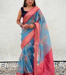 Blue tissue crush silk floral printed saree with zari woven border