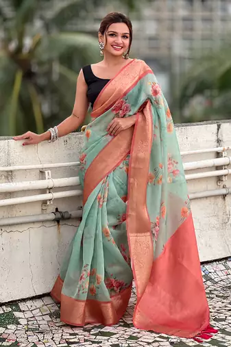 Sky blue tissue crush silk floral printed saree with zari woven border