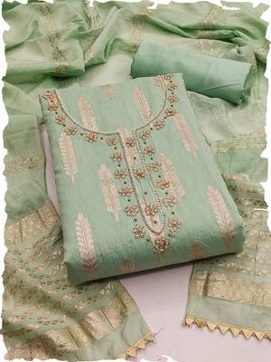 Green silk blend banarasi jacquard embroidered unstitched dress material 1