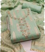 Green silk blend banarasi jacquard embroidered unstitched dress material