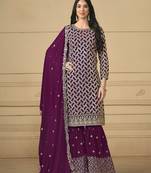 Embroidered faux georgette salwar kameez in purple