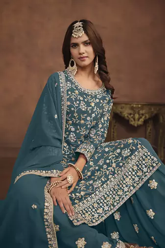 Faux georgette teal embroidered palazzo salwar kameez
