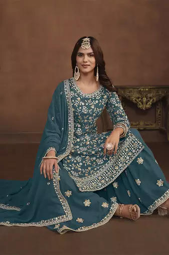 Faux georgette teal embroidered palazzo salwar kameez