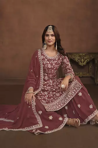 Faux georgette copper rust embroidered palazzo salwar kameez