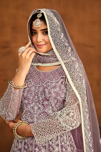 Purple net embroidered floor length salwar kameez
