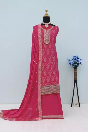 Rani pink jacquard semi stitched ceremonial suits
