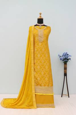 Yellow jacquard semi stitched ceremonial suits 2