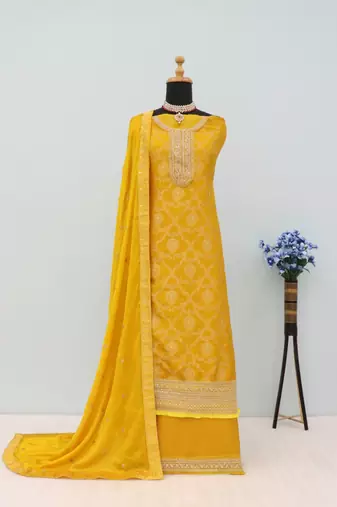 Yellow jacquard semi stitched ceremonial suits