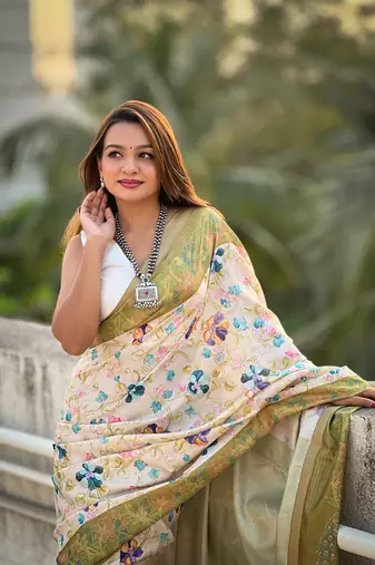 Mehendi green tussar silk kalamkari printed saree with zari woven border