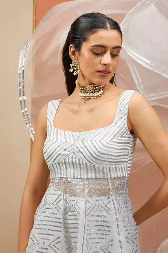 White peplum with silver gota set
