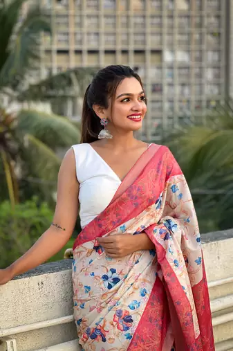 Coral red tussar silk kalamkari printed saree with zari woven border