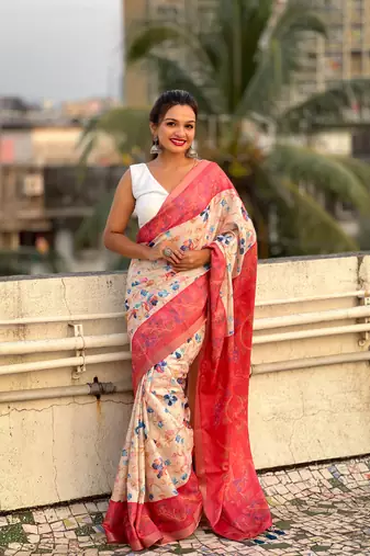 Coral red tussar silk kalamkari printed saree with zari woven border